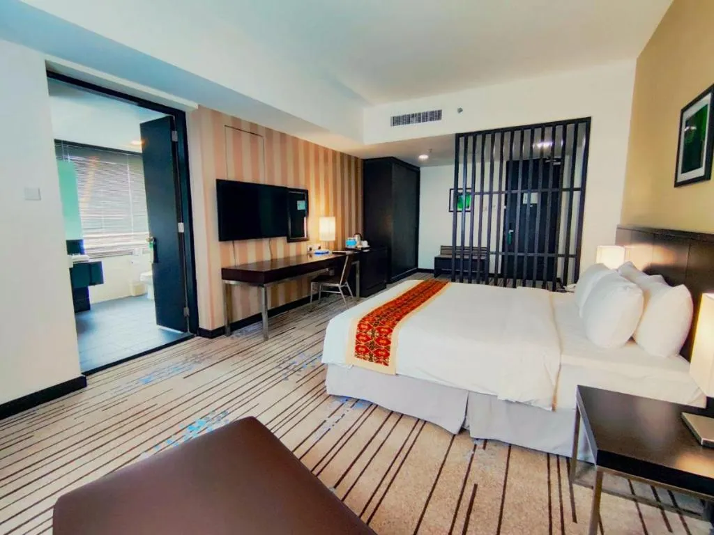Bed in RH Hotel Sibu