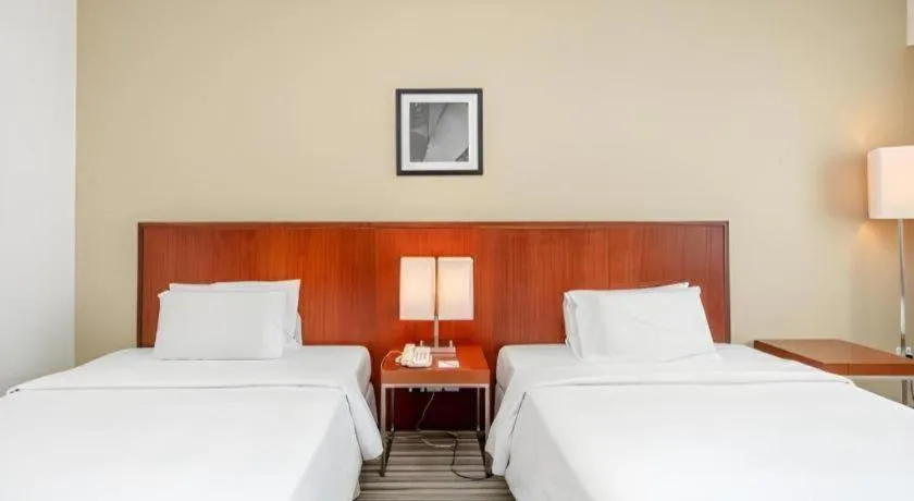 Bed in RH Hotel Sibu