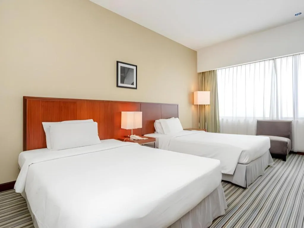 Bed in RH Hotel Sibu