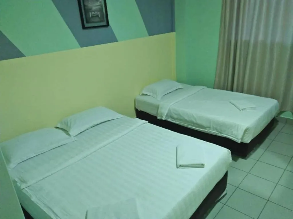 Bed in Hotel Tuaran
