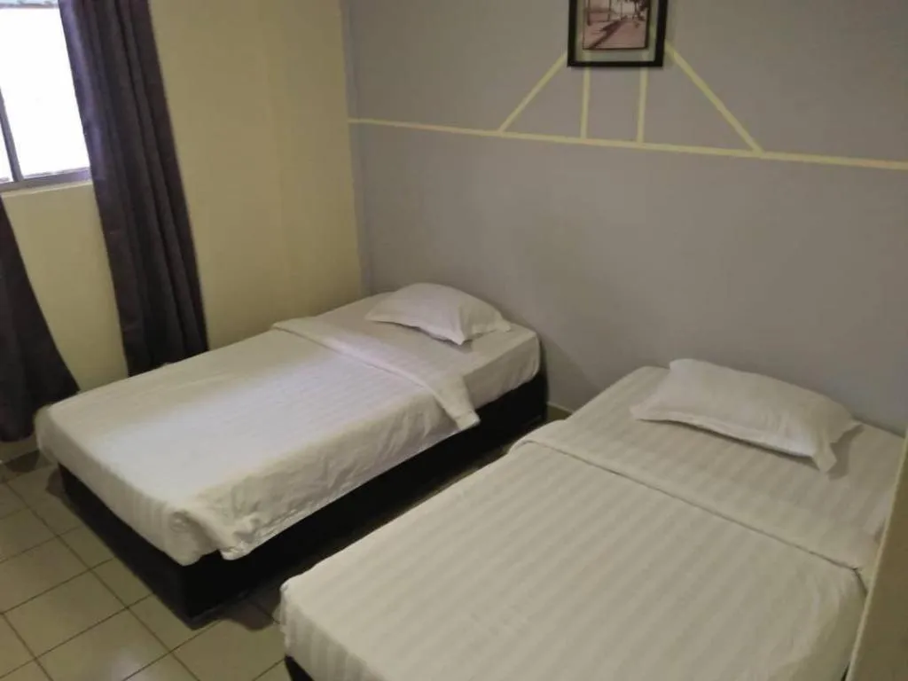 Bed in Hotel Tuaran