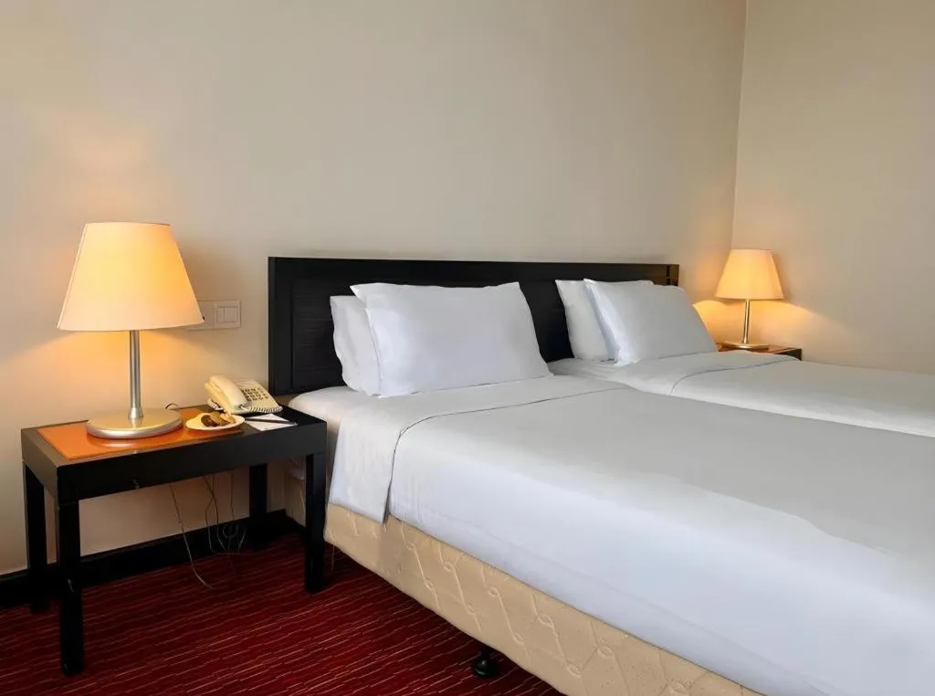 Bed in Tanahmas The Sibu Hotel