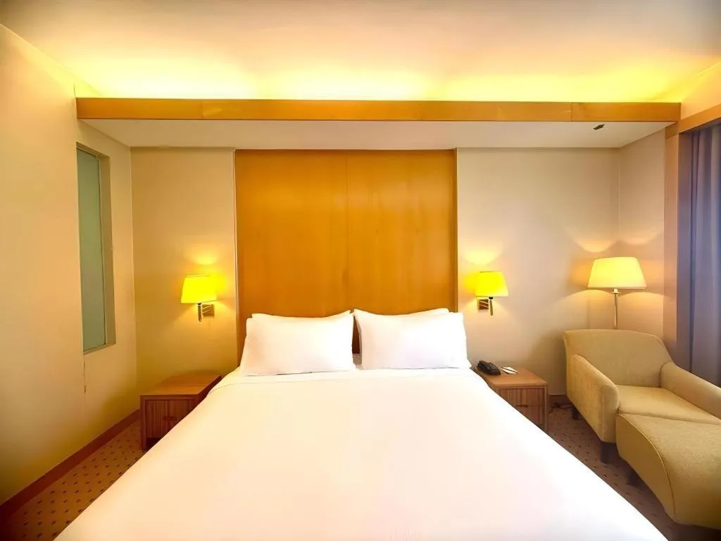 Bed in Tanahmas The Sibu Hotel