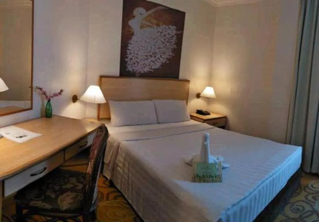 Bed in The Orchid Hotel