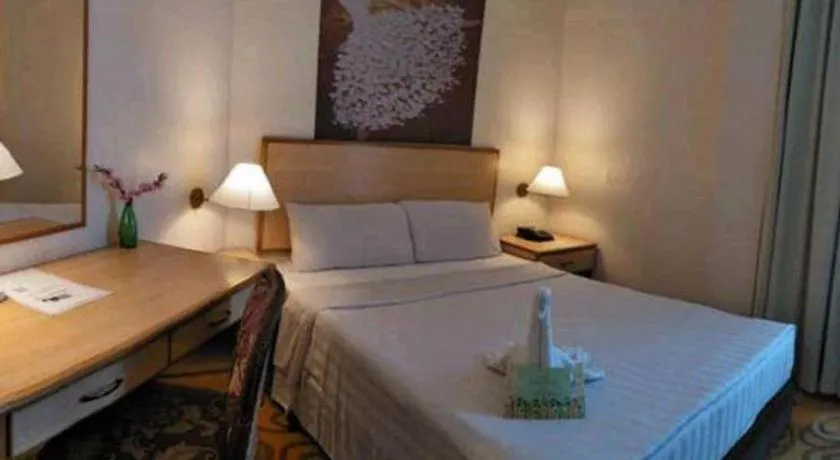 Bed in The Orchid Hotel