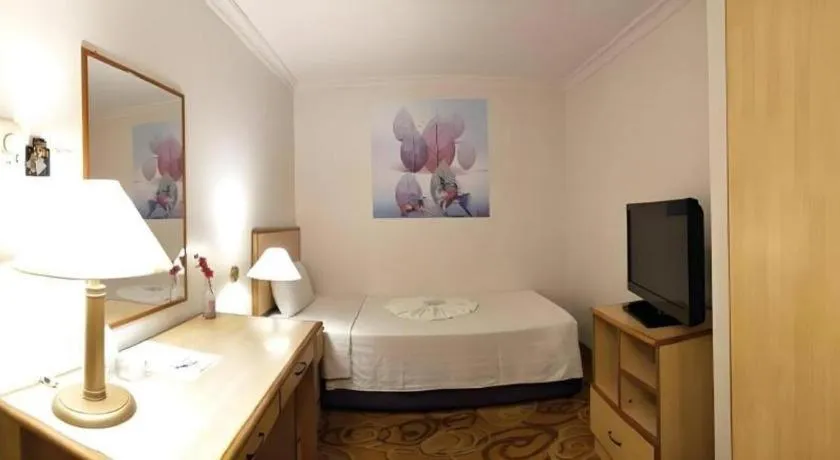 Bed in The Orchid Hotel