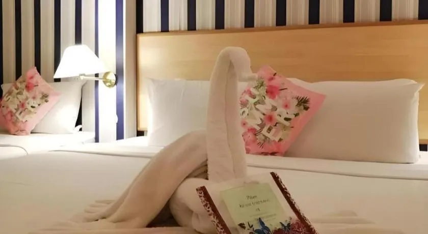 Bed in The Orchid Hotel