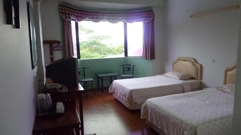 Bed in Hotel Hung Hung