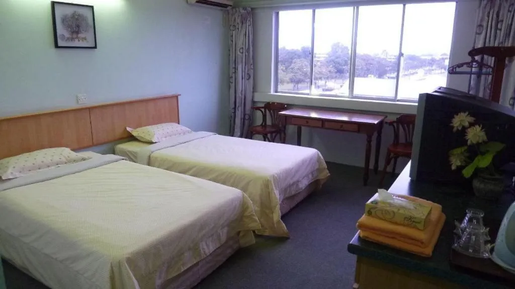 Bed in Hotel Hung Hung