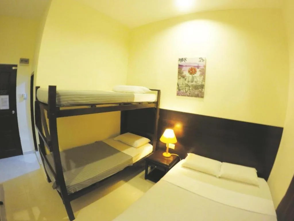 Bed in Perhentian Tivoli Inn