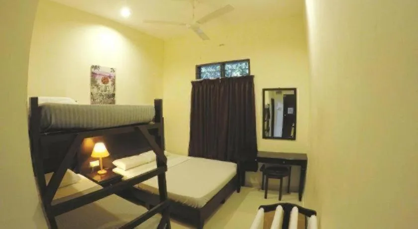 Bed in Perhentian Tivoli Inn