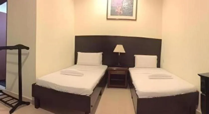 Bed in Perhentian Tivoli Inn