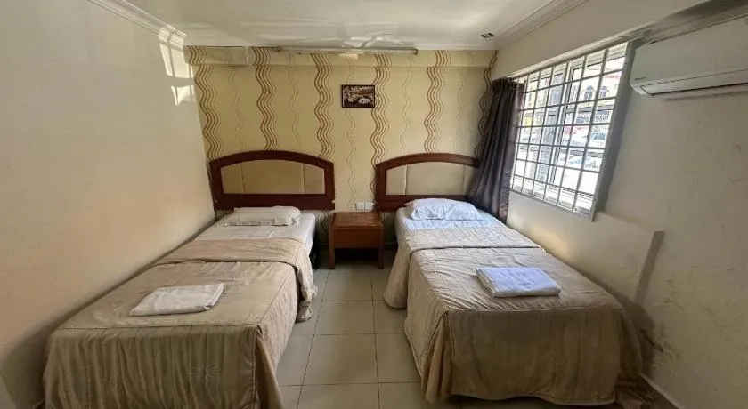 Bed in Angsa Hotel