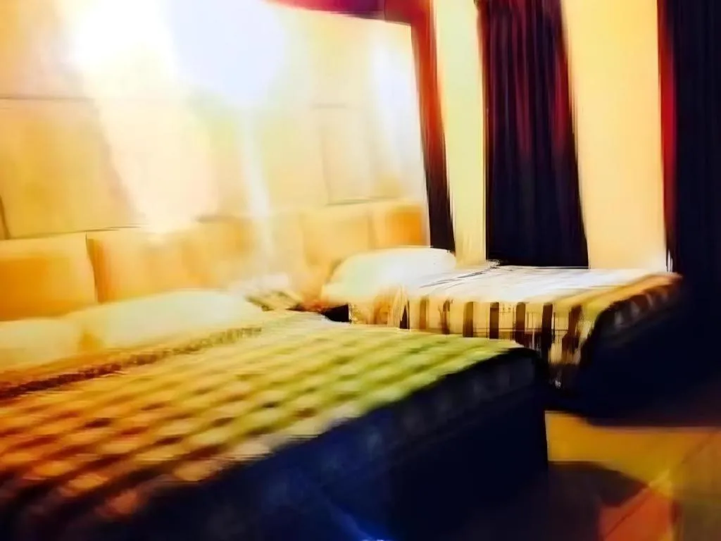 Bed in Admiral Hotel