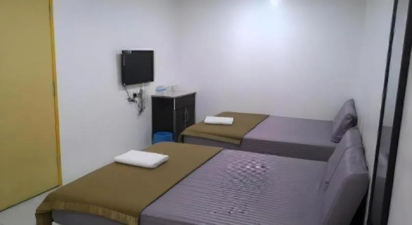 Bed in Chin Yee Hotel