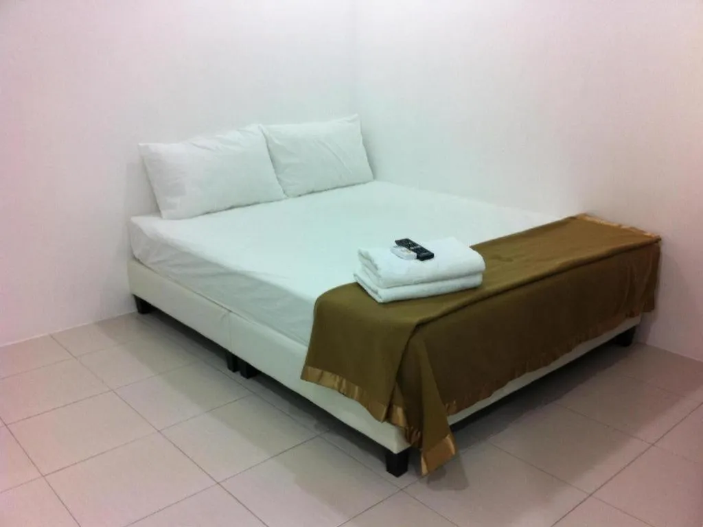 Bed in Chin Yee Hotel