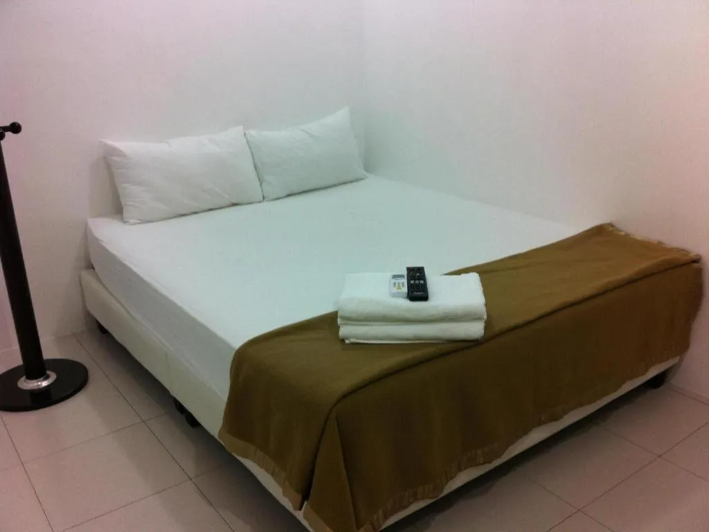 Bed in Chin Yee Hotel