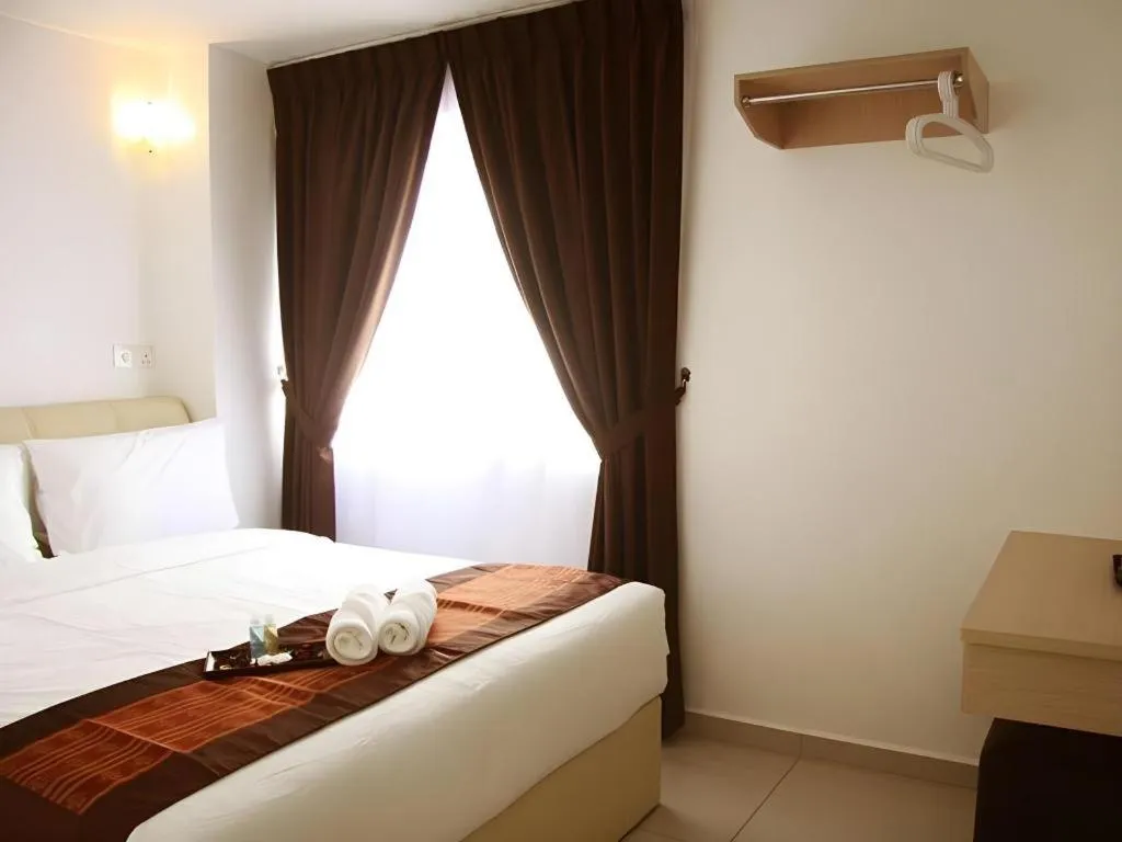 Bed in Peach Hill Hotel & Cafe