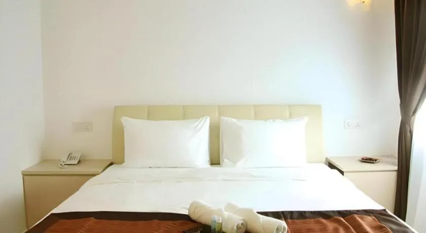 Bed in Peach Hill Hotel & Cafe