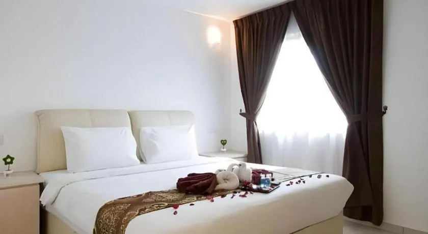 Bed in Peach Hill Hotel & Cafe