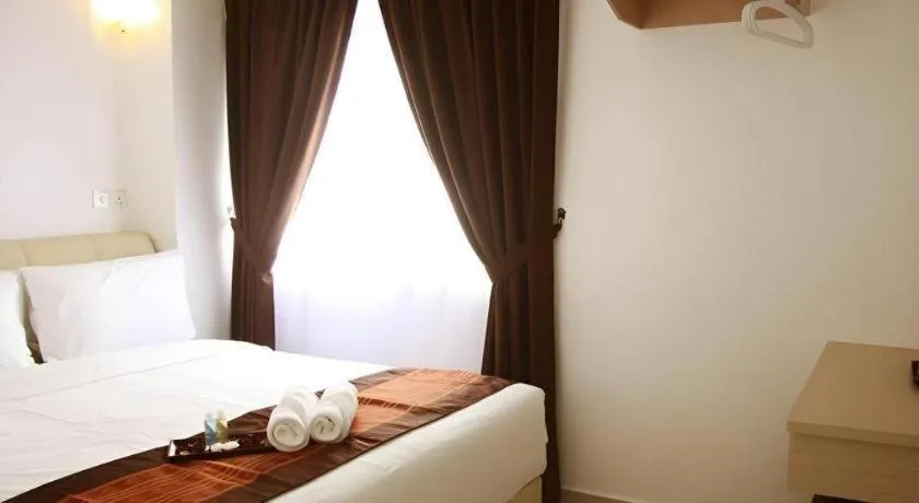 Bed in Peach Hill Hotel & Cafe