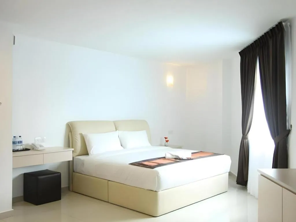 Bed in Peach Hill Hotel & Cafe