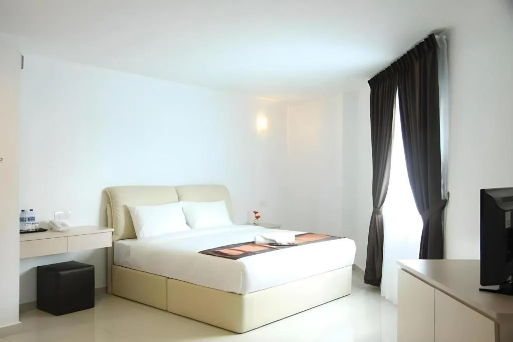 Bed in Peach Hill Hotel & Cafe