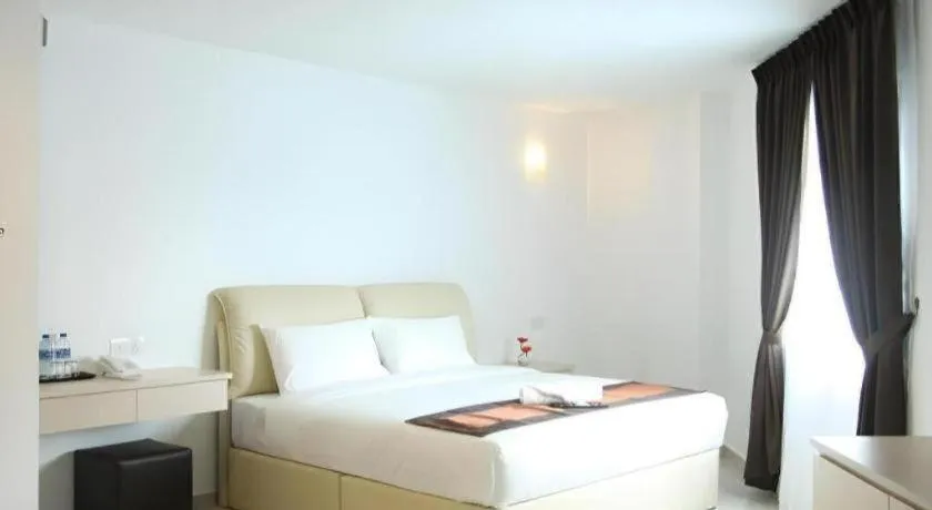 Bed in Peach Hill Hotel & Cafe