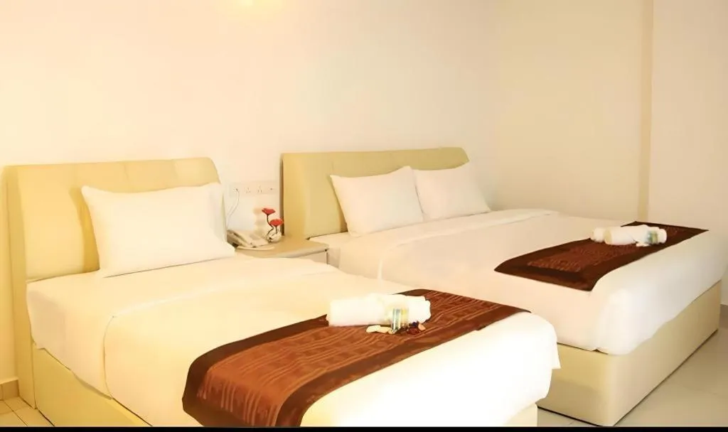 Bed in Peach Hill Hotel & Cafe