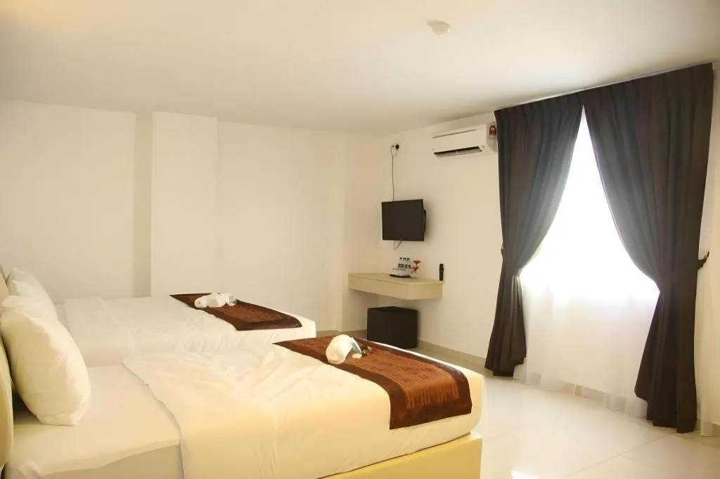 Bed in Peach Hill Hotel & Cafe