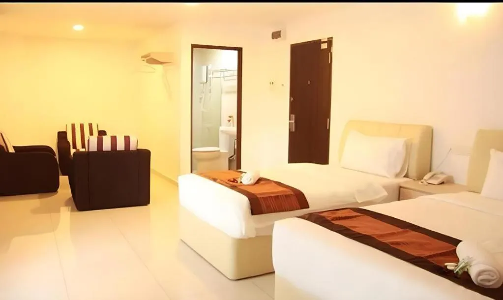 Bed in Peach Hill Hotel & Cafe