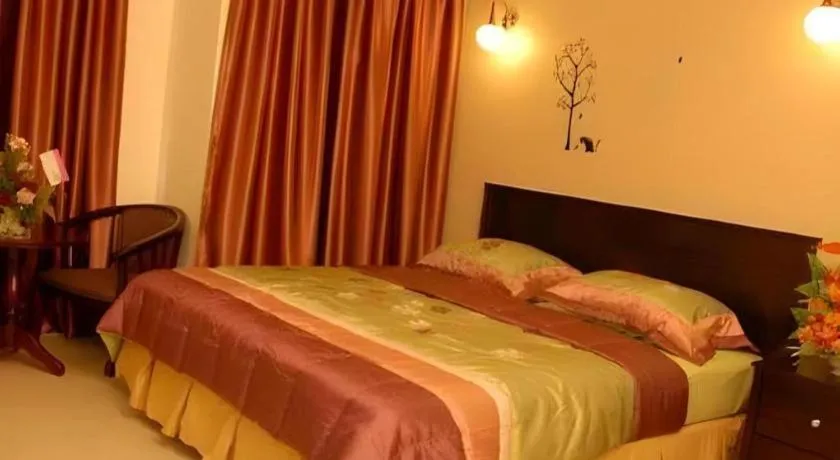 Bed in Loong Fatt Hotel