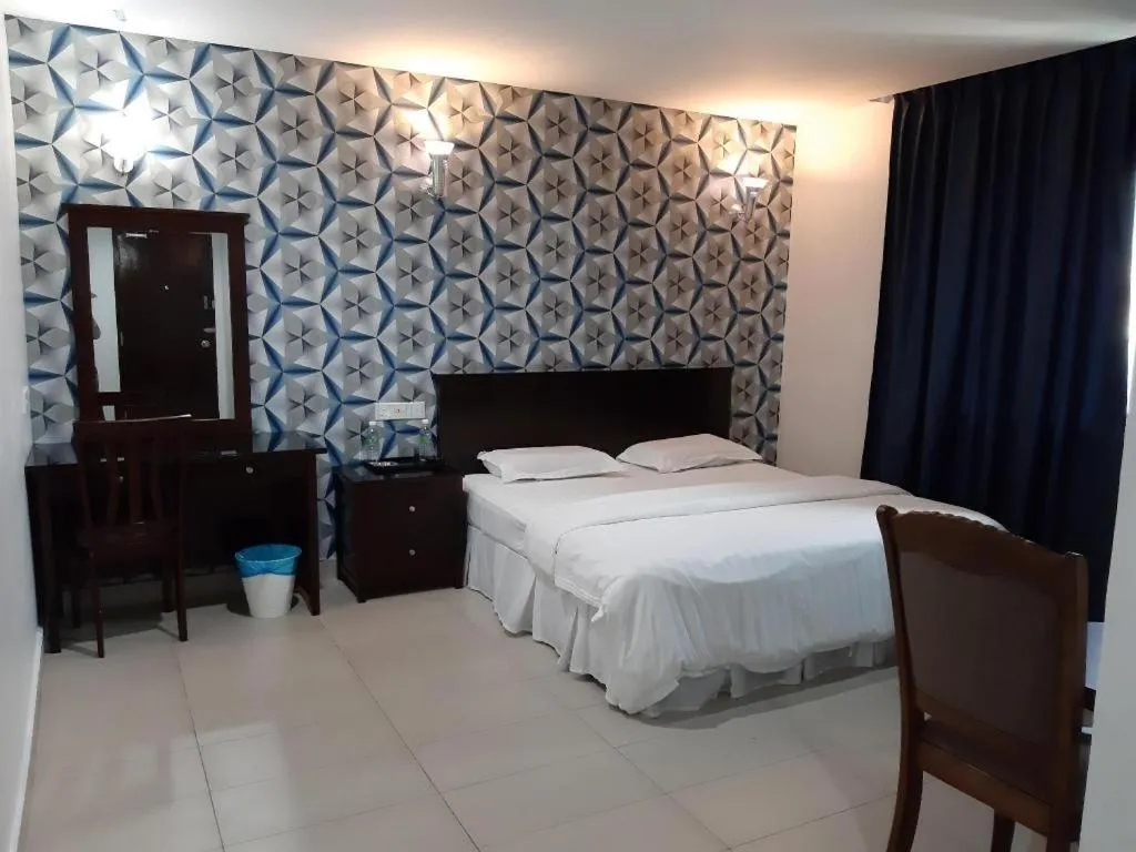 Bed in Loong Fatt Hotel