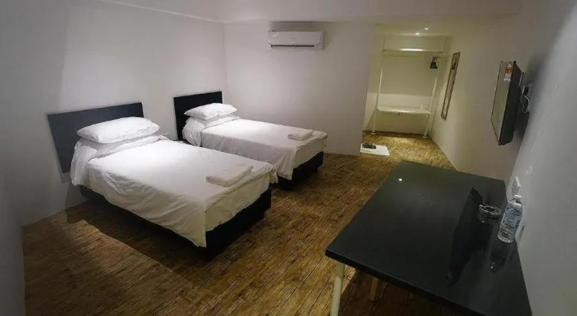 Bed in Riverine Garden Hotel