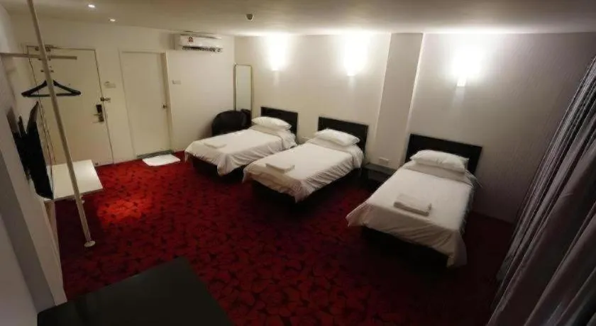 Bed in Riverine Garden Hotel