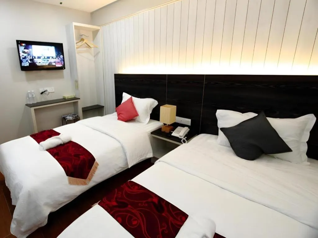 Bed in Grand SH Hotel