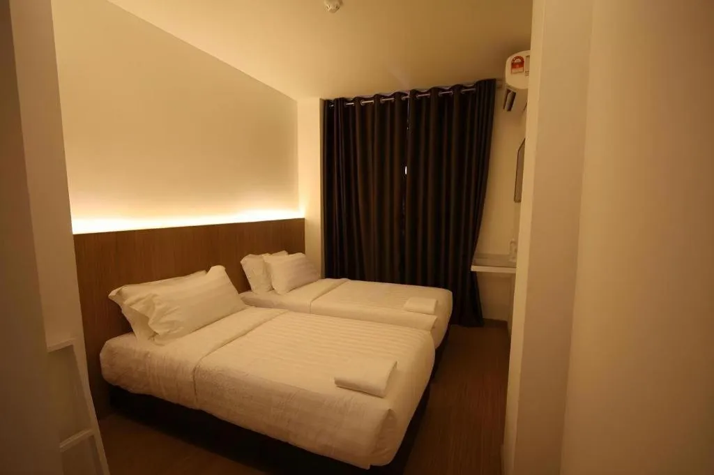 Bed in Place2Stay Business Hotel @ Waterfront