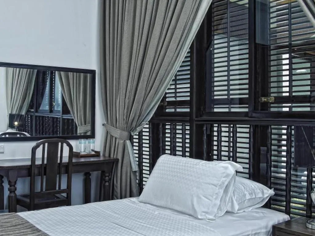 Bed in Courtyard at Heeren Boutique Hotel