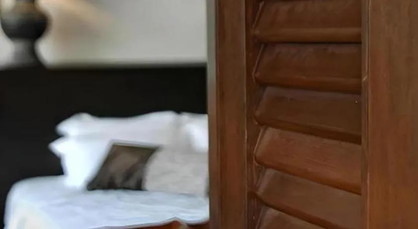 Bed in Courtyard at Heeren Boutique Hotel