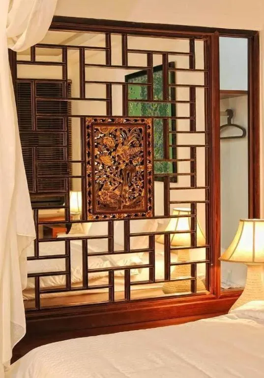 Bed in Courtyard at Heeren Boutique Hotel