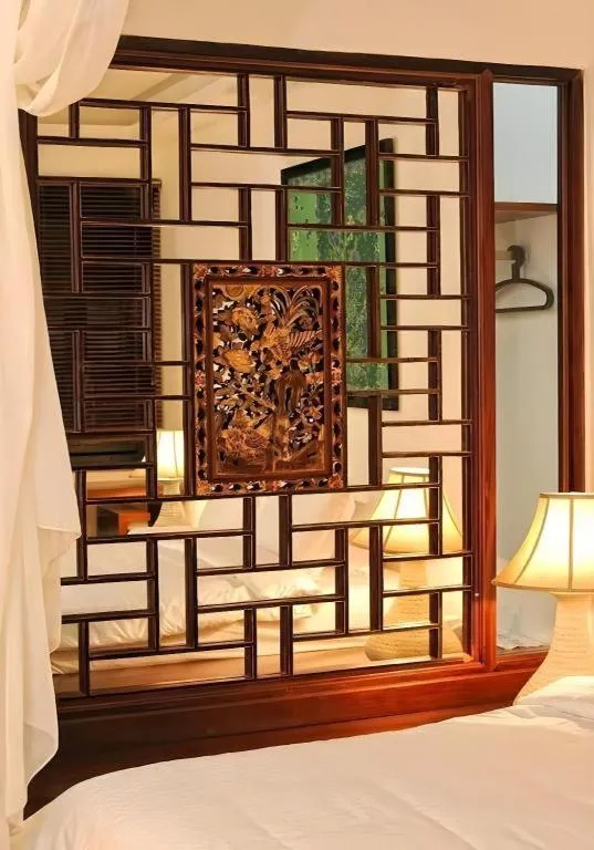 Bed in Courtyard at Heeren Boutique Hotel