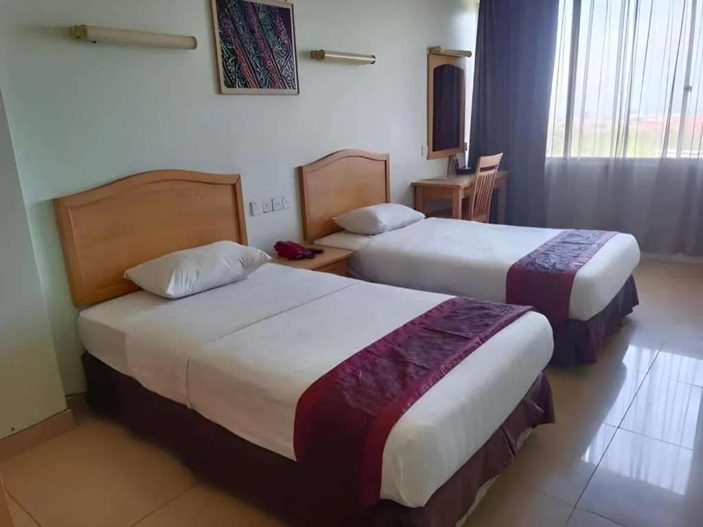 Bed in Li Hua Hotel Bintulu