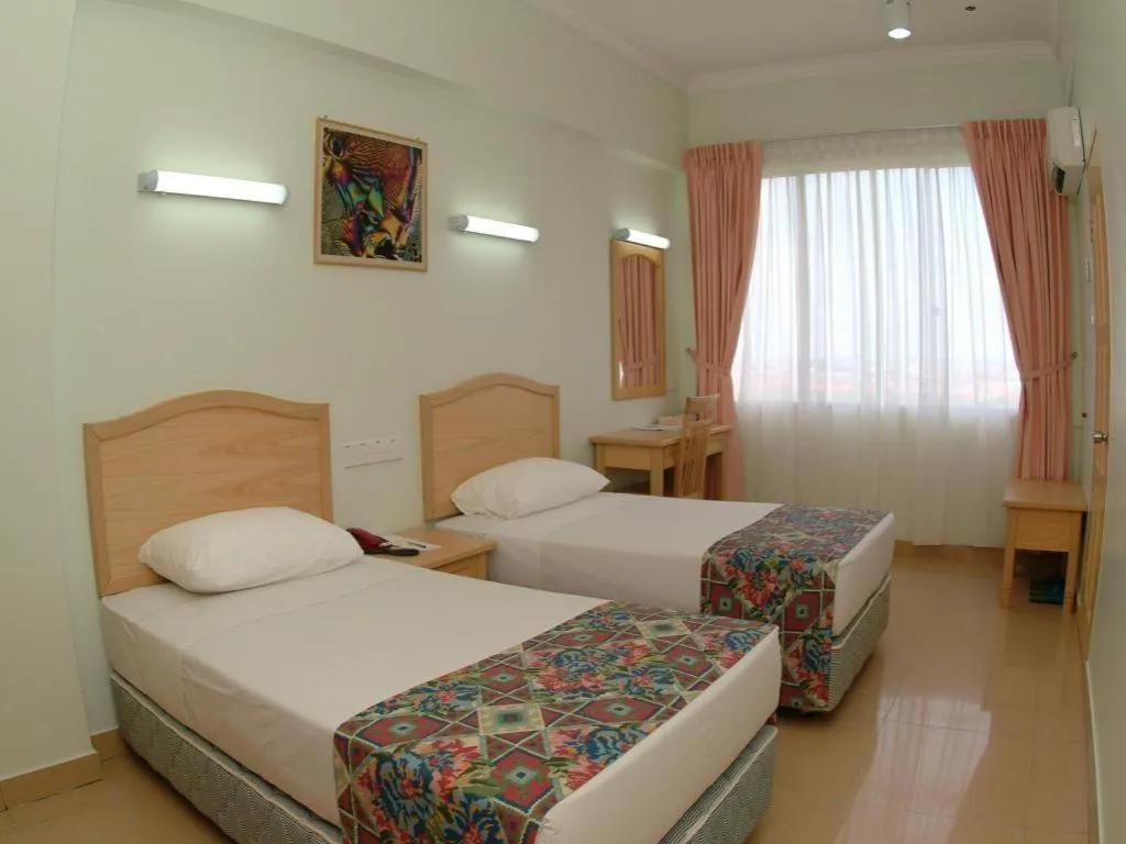 Bed in Li Hua Hotel Bintulu