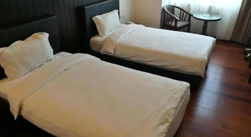 Bed in Kemena View Hotel Kuching (formerly known Merchant Hotel Kuching)