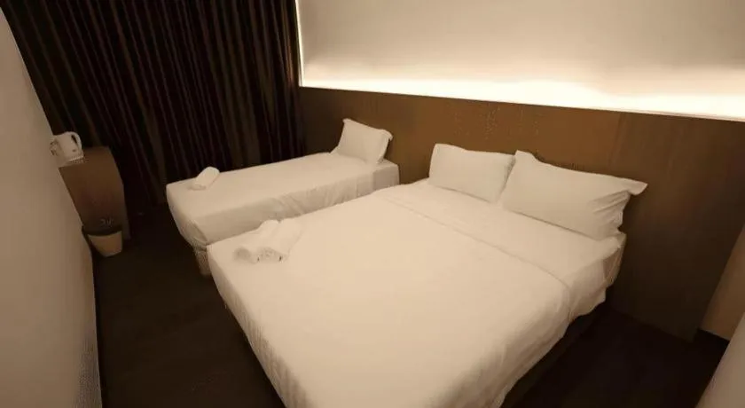 Bed in Place2Stay Business Hotel @ Metrocity