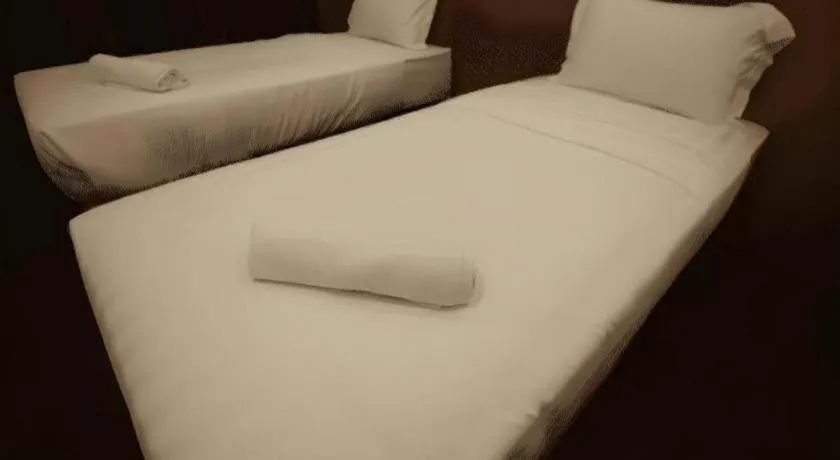 Bed in Place2Stay Business Hotel @ Metrocity