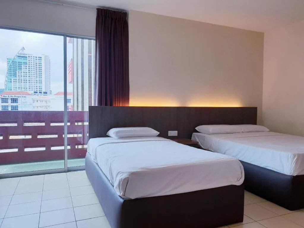 Bed in Champcity Hotel Sdn Bhd