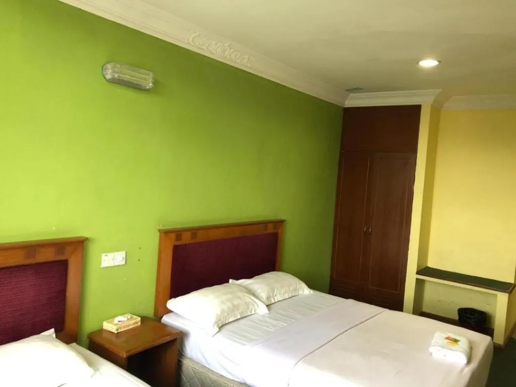 Bed in Hotel Perdana