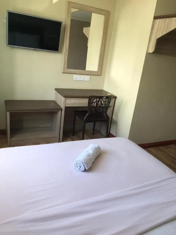 Bed in Hotel Perdana