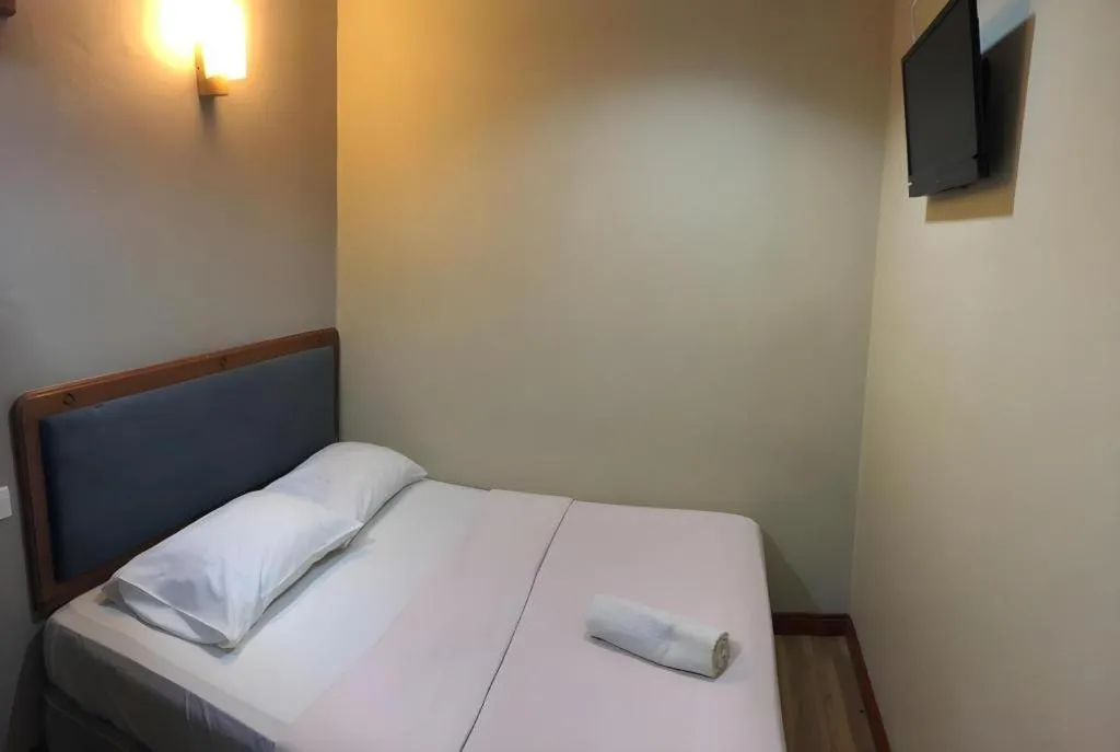 Bed in Hotel Perdana